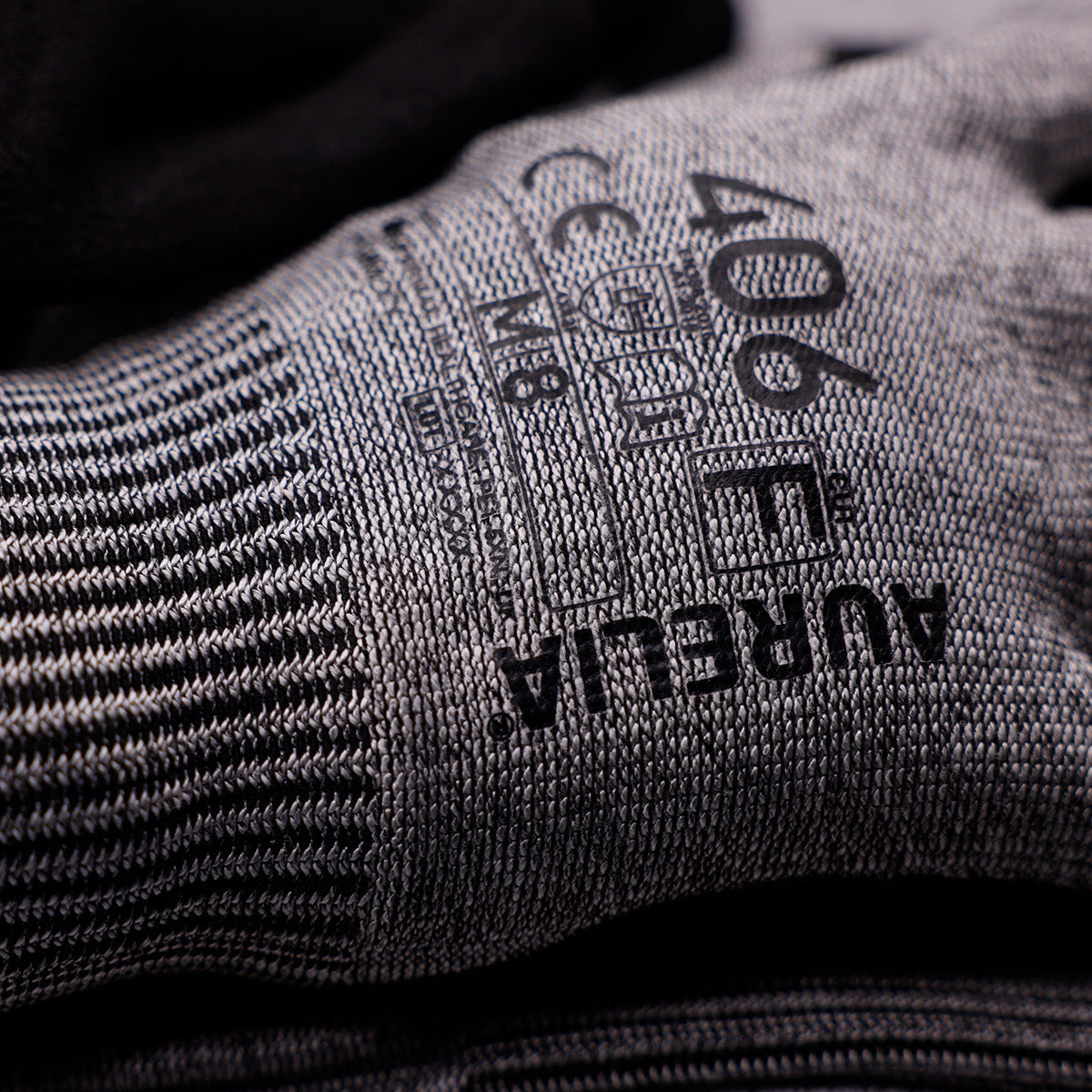 Aurelia 406 Cut F protective glove with black sandy nitrile coating