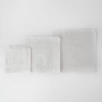 Strung White Sulphite Paper Bags